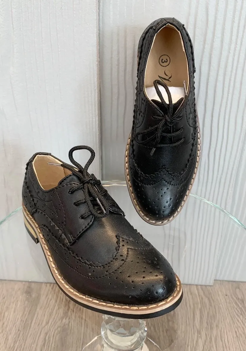 Black leather brogues